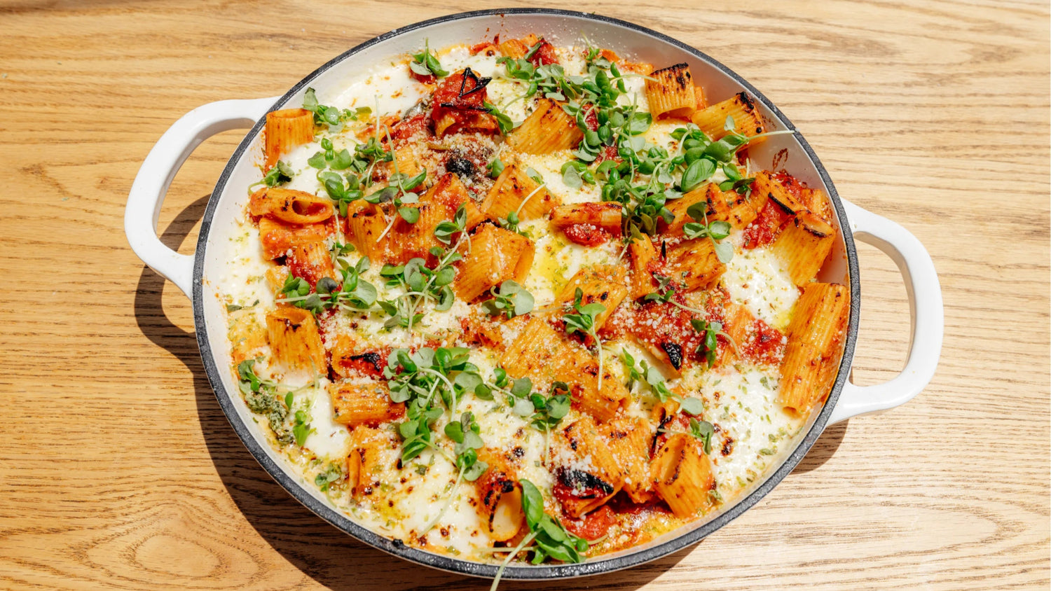 Baked Rigatoni with blistered cherry tomatoes, fresh mozzarella and fennel pollen recipe poster image