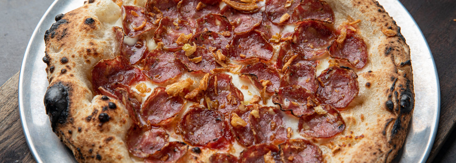 Fennel Salami & Crispy Onion Sourdough Pizza - Roccbox recipe poster image