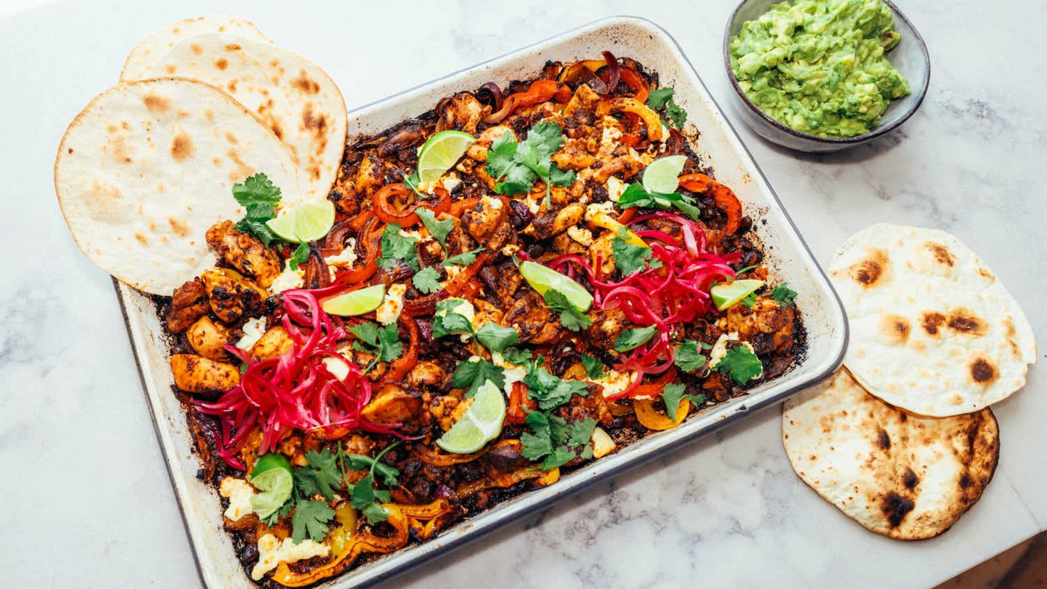 Sheet Pan Chicken Fajitas with Guacamole and Tortillas